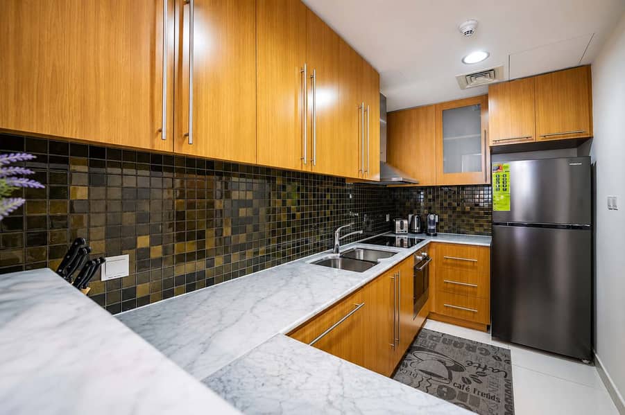 9 Dubai Apartment: 1BR with Pool, Gym & Balcony