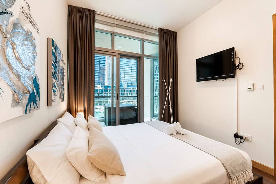 13 Dubai Apartment: 1BR with Pool, Gym & Balcony