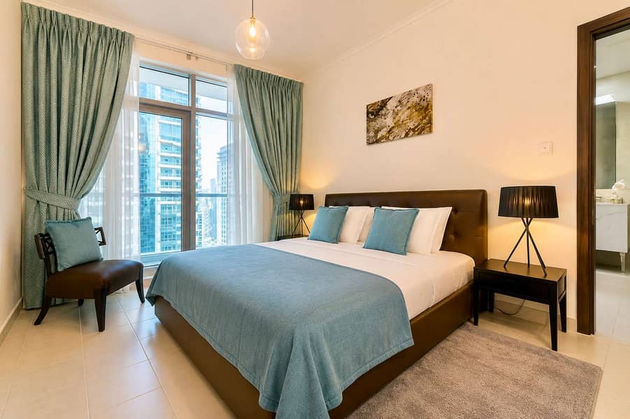 9 Torch Tower Marina 1BR: Balcony, Gym & Views!