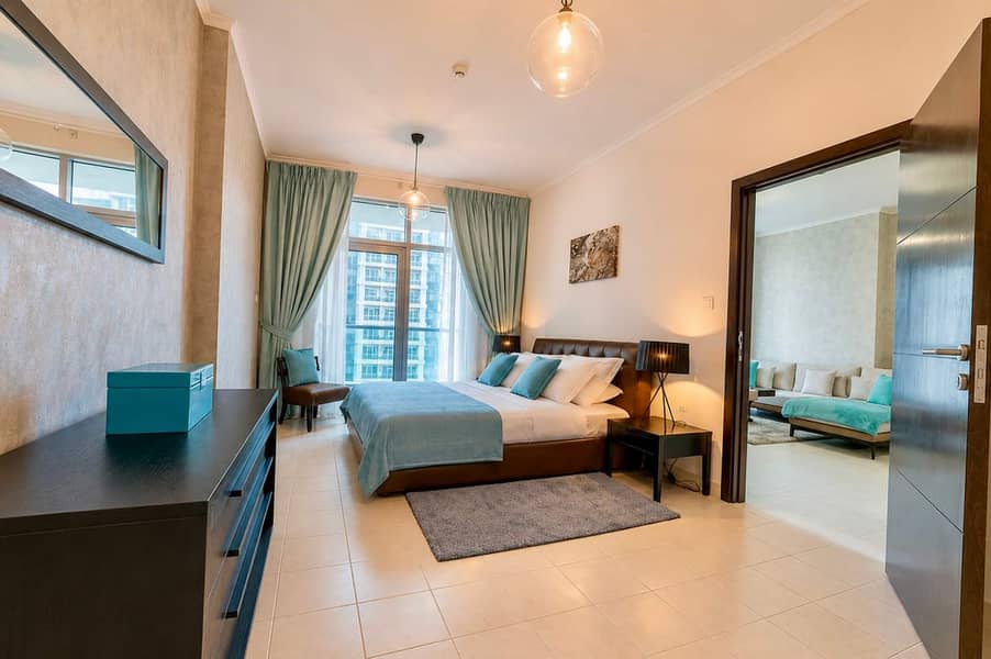 10 Torch Tower Marina 1BR: Balcony, Gym & Views!