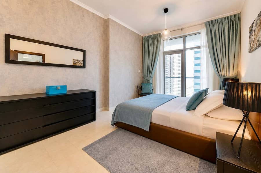 11 Torch Tower Marina 1BR: Balcony, Gym & Views!