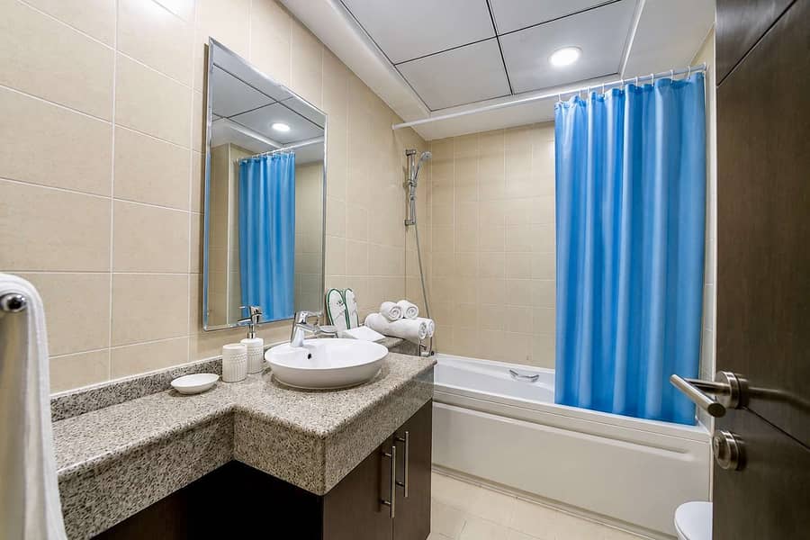 14 Torch Tower Marina 1BR: Balcony, Gym & Views!