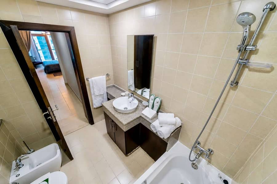 15 Torch Tower Marina 1BR: Balcony, Gym & Views!