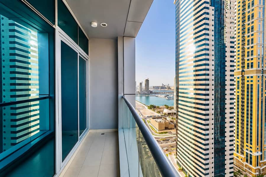 17 Torch Tower Marina 1BR: Balcony, Gym & Views!