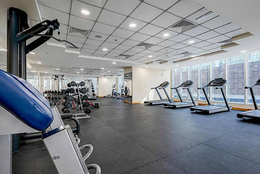 21 Torch Tower Marina 1BR: Balcony, Gym & Views!