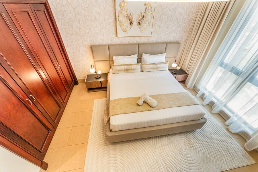 15 Dubai Apartment: 2 Bedrooms & Swimming Pool