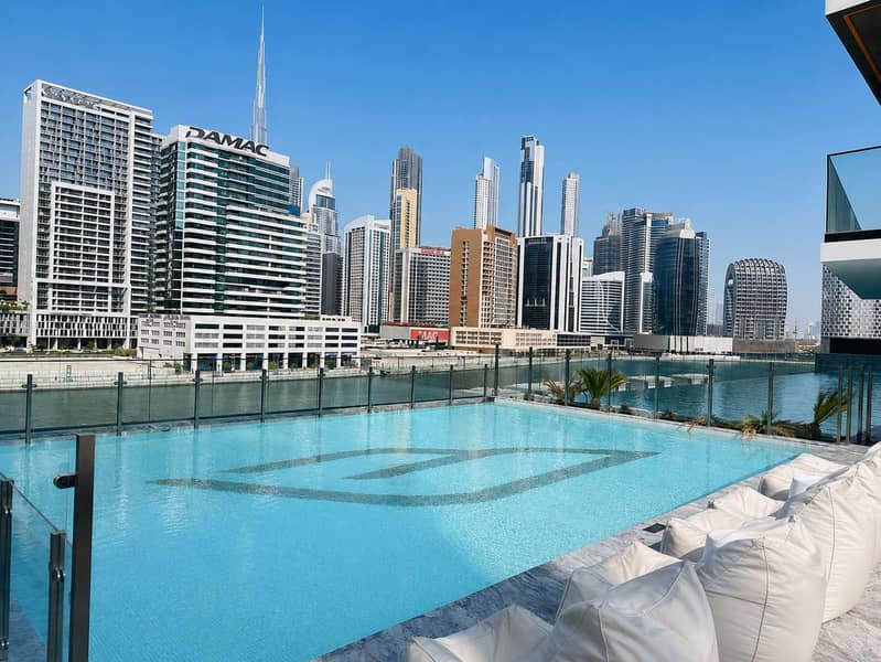 19 Bingatti Canal 1BR Apartment with Gym & Views