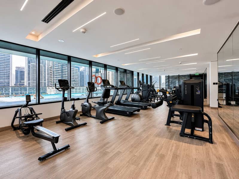 21 Bingatti Canal 1BR Apartment with Gym & Views