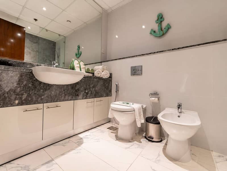 13 Luxury 1BR Apt in Dubai with Pool & Gym