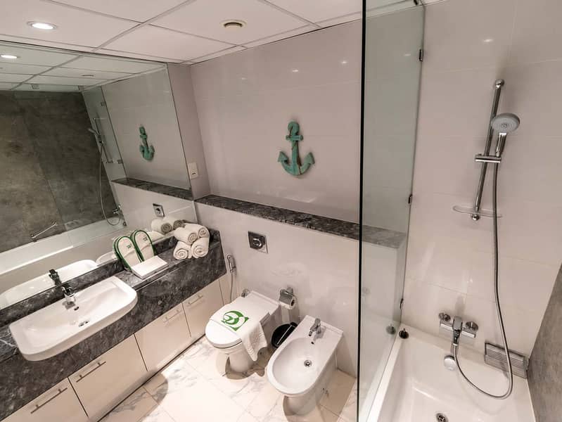 14 Luxury 1BR Apt in Dubai with Pool & Gym