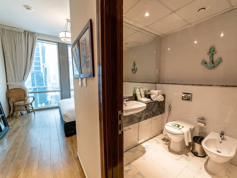 15 Luxury 1BR Apt in Dubai with Pool & Gym