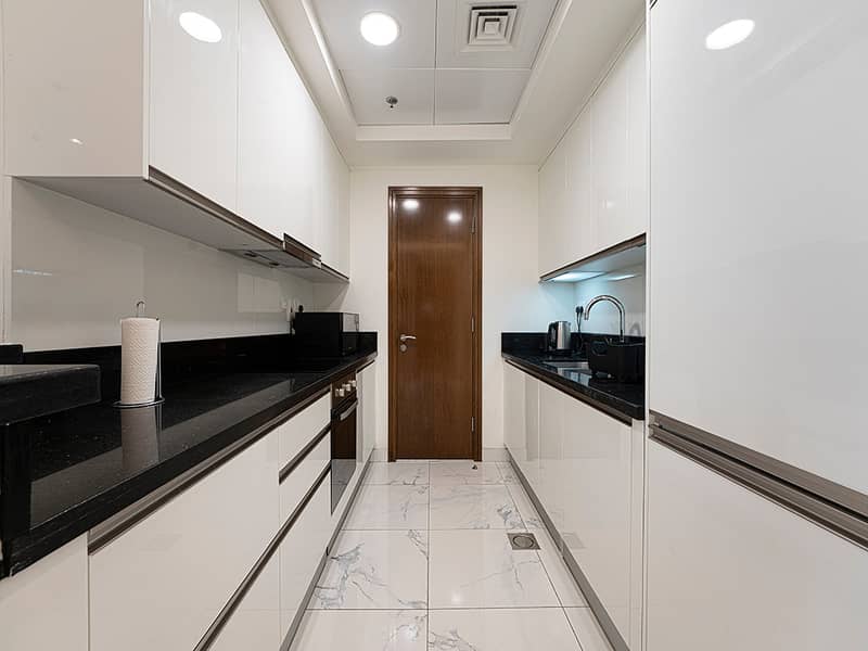 10 Noora Tower 1 BR: Canal Views & Pool Access