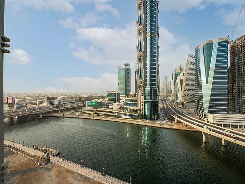 21 Noora Tower 1 BR: Canal Views & Pool Access