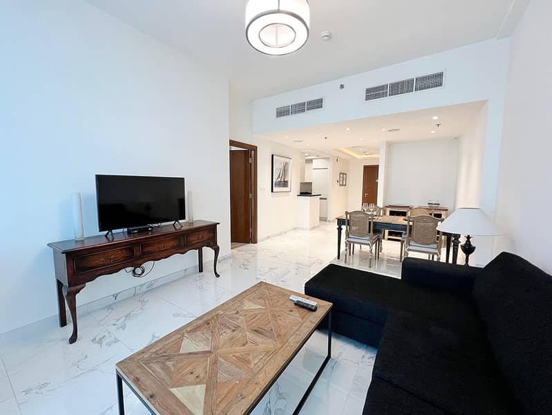 Noora Tower 1BR: Dubai Luxury with Pool & Gym Noora Tower 1BR: Dubai Luxury with Pool & Gym