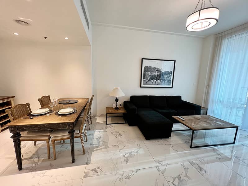 2 Noora Tower 1BR: Dubai Luxury with Pool & Gym