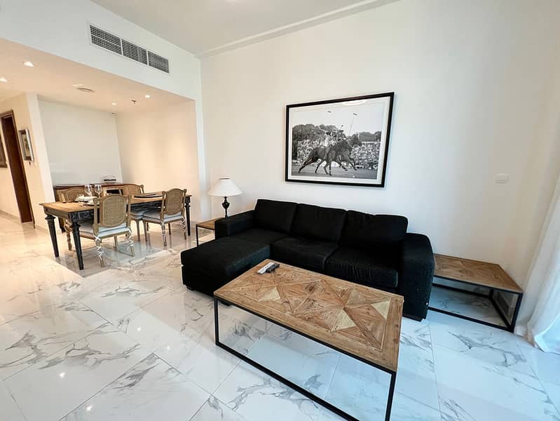 5 Noora Tower 1BR: Dubai Luxury with Pool & Gym