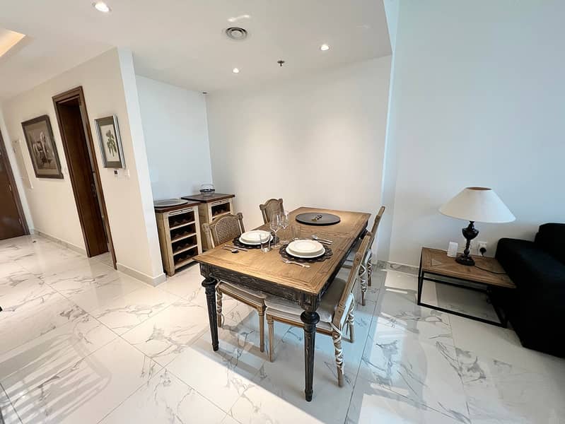 8 Noora Tower 1BR: Dubai Luxury with Pool & Gym