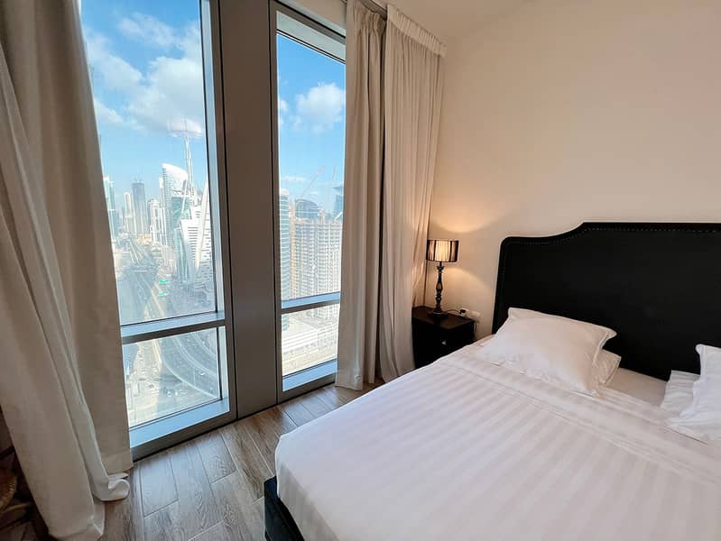 14 Noora Tower 1BR: Dubai Luxury with Pool & Gym