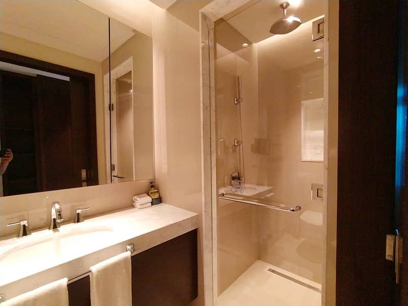18 Noora Tower 1BR: Dubai Luxury with Pool & Gym