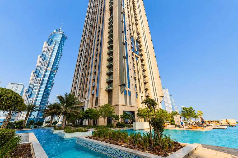 21 Noora Tower 1BR: Dubai Luxury with Pool & Gym