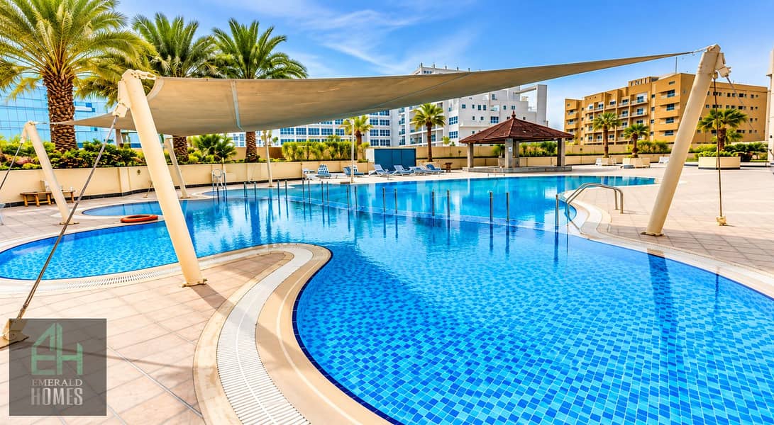 14 Sunny Resort Pool with Palm Trees and Canopy. png