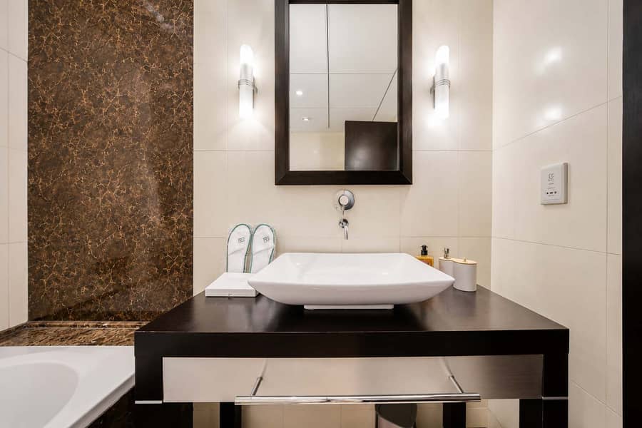 14 JLT 1-Bed Apartment: City Views, Gym & Balcony