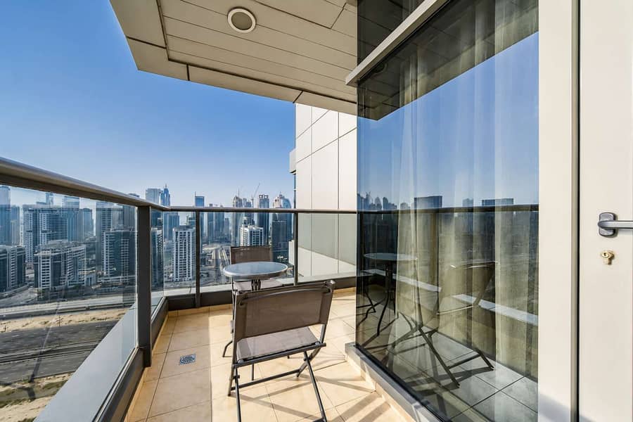 19 JLT 1-Bed Apartment: City Views, Gym & Balcony