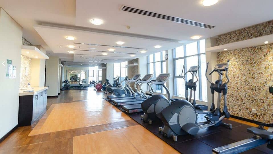 21 JLT 1-Bed Apartment: City Views, Gym & Balcony