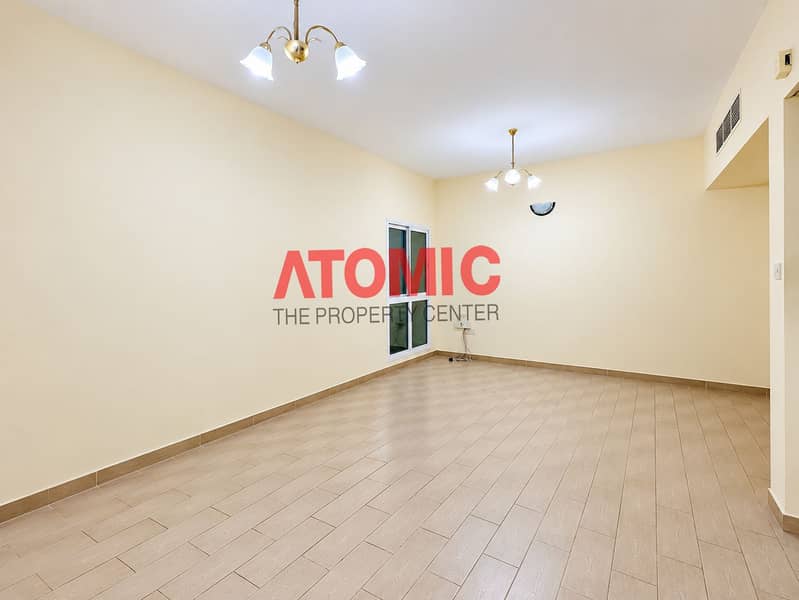 4 Empty Cream Living Room with Chandeliers. png