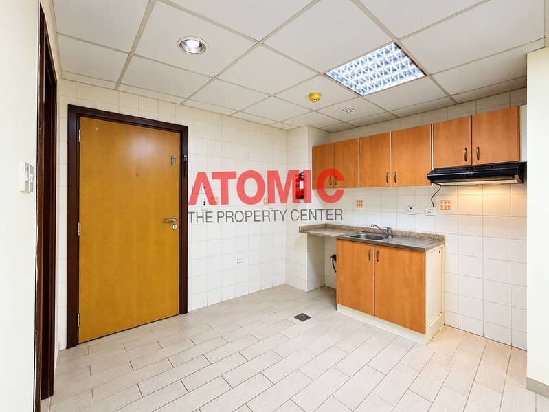 2 Clean Modern Kitchenette Interior. png