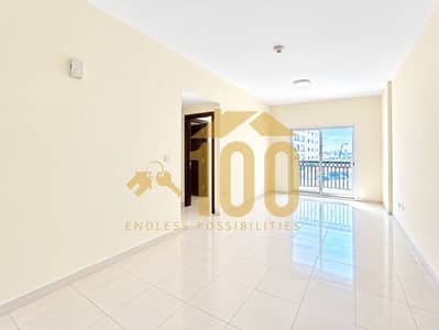 2 Bedroom Apartment for Rent in International City, Dubai - Bright Empty Apartment with Balcony Views. png 2 Bedroom Apartment for Rent in International City, Dubai - Bright Empty Apartment with Balcony Views. png