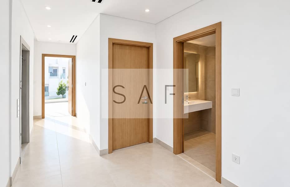 14 Bright Modern Hallway with Oak Doors. png