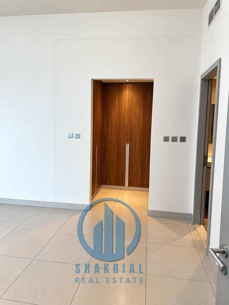 6 Modern Minimalist Hallway with Wooden Alcove. png