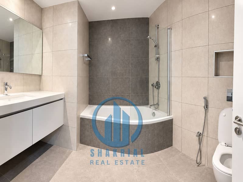 9 Modern Minimalist Bathroom in Stone Tones. png