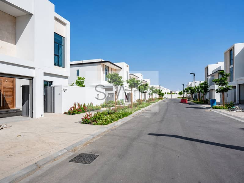 8 Modern suburban street with minimalist villas. png