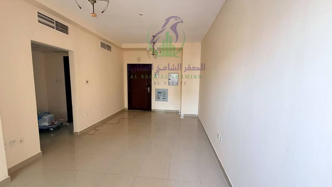 2 apartment-for-rent-1-bedroom-altaawn-alsharqh-living-room-01. jpg