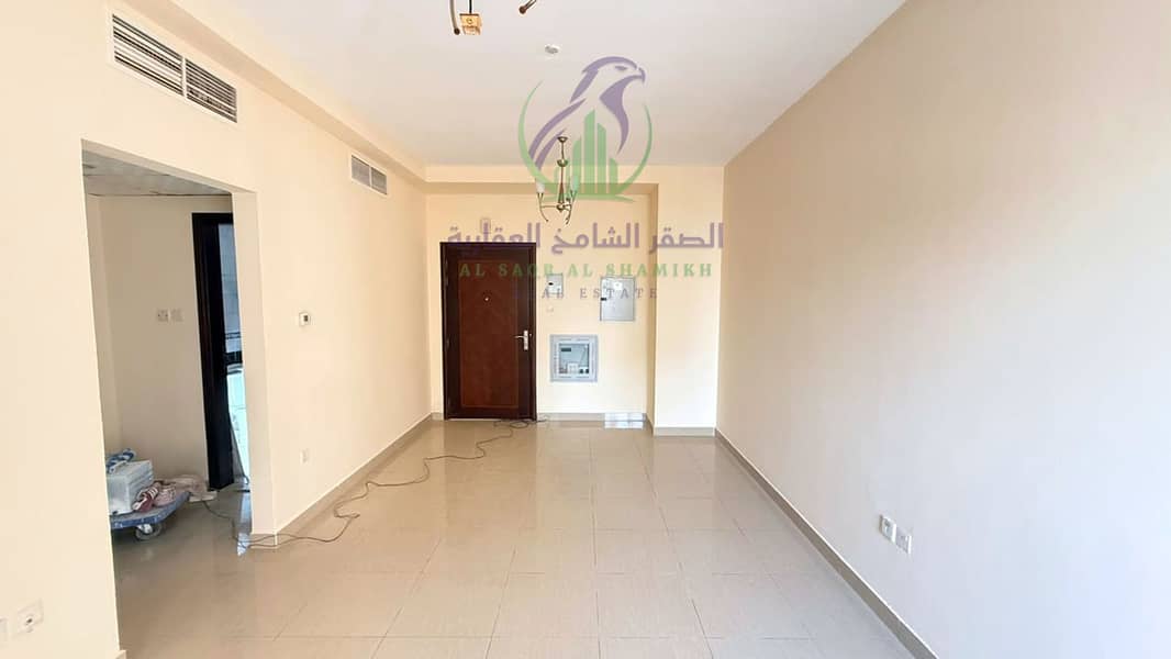 4 apartment-for-rent-1-bedroom-altaawn-alsharqh-living-room-03. jpg
