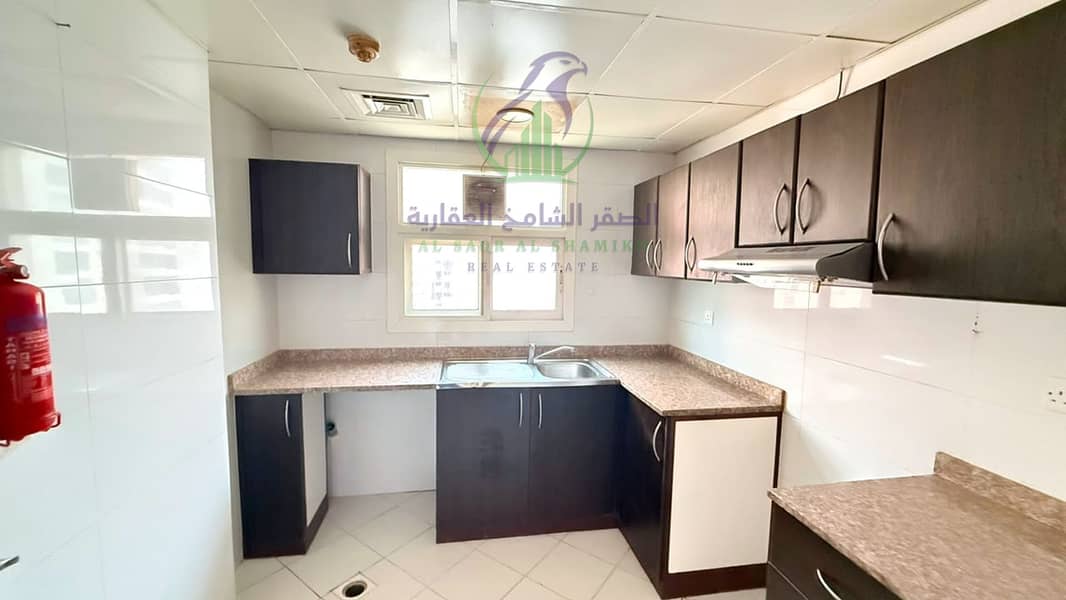 11 apartment-for-rent-1-bedroom-altaawn-alsharqh-kitchen-04. jpg