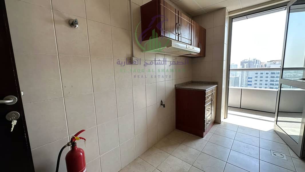 17 apartment-for-rent-2-bedroom-altaawn-alsharqh-kitchen-09. jpg