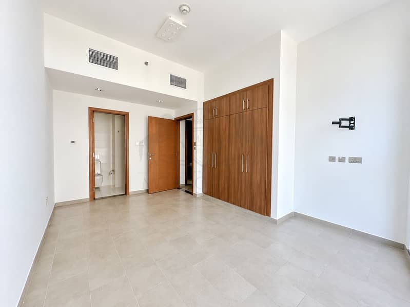 6 Minimalist Room with Warm Wood Accents. png