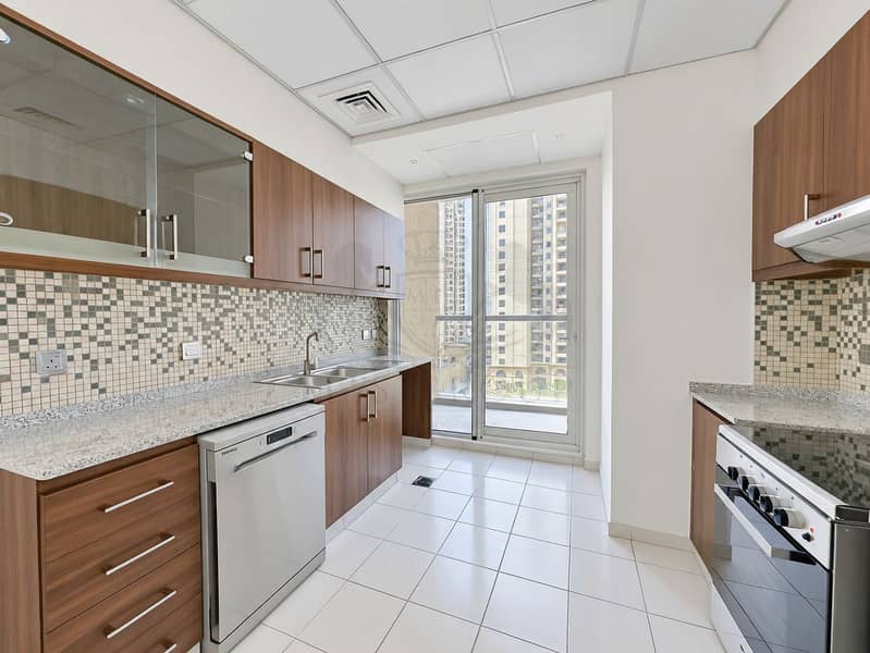 12 Bright Modern Kitchen with City View. png
