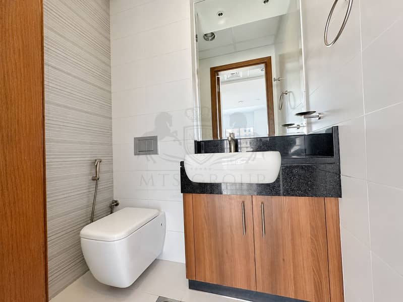 15 Modern Bathroom with Wood Vanity and Mirror. png