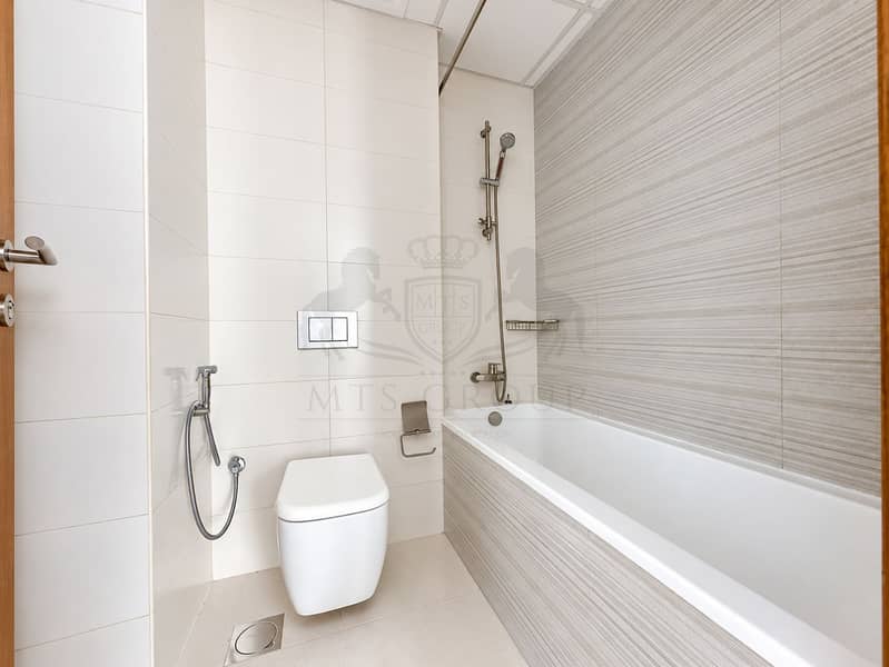 16 Modern Minimalist Bathroom with Bathtub. png