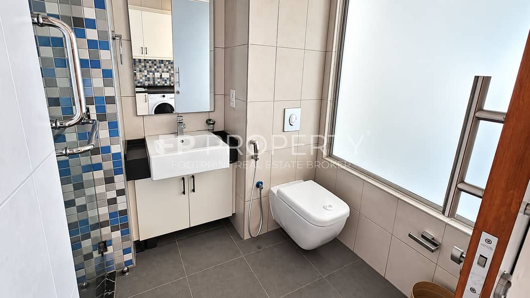 5 Modern Mosaic-Tiled Bathroom Interior. png