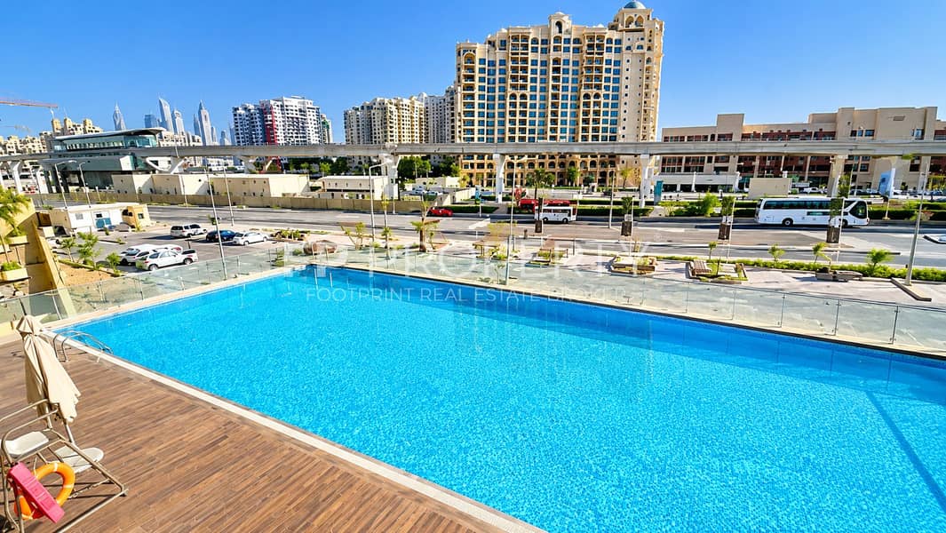 9 Sunlit Urban Pool and City Skyline. png