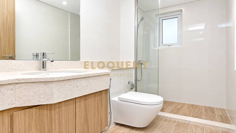 8 Modern Scandinavian Bathroom with Warm Wood Accents. png