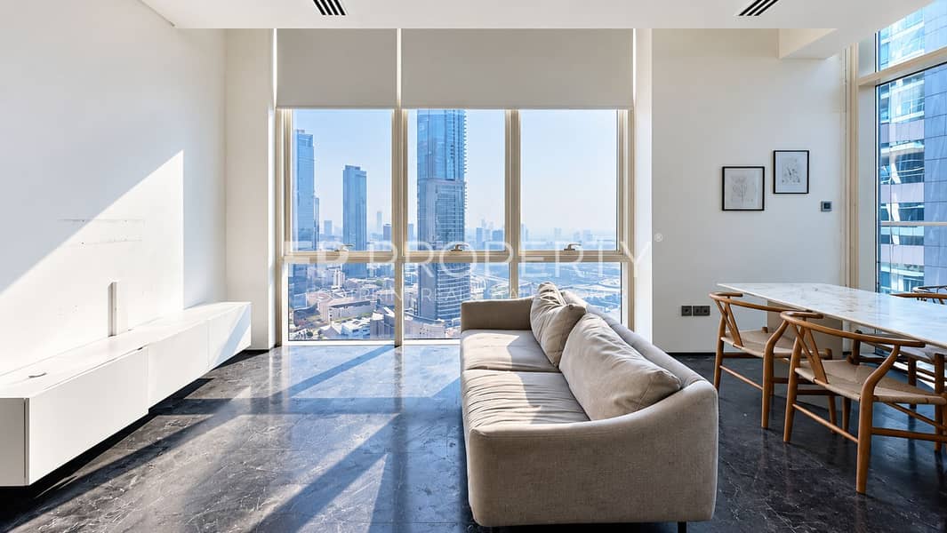 6 Sunlit Minimalist Apartment with Skyline Views. png
