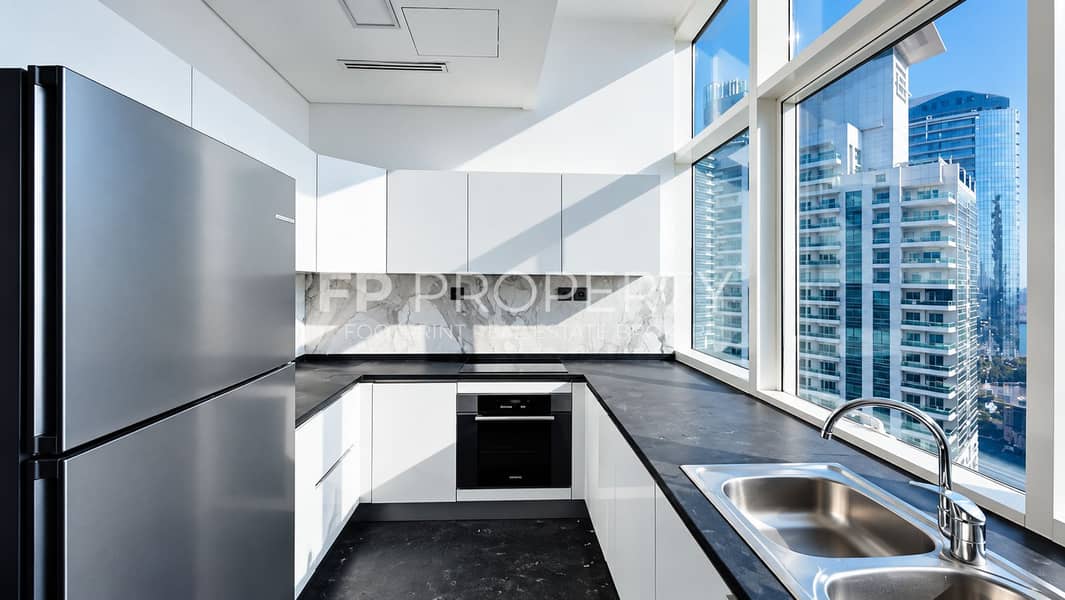 7 Sunlit Minimalist Kitchen with City Views. png