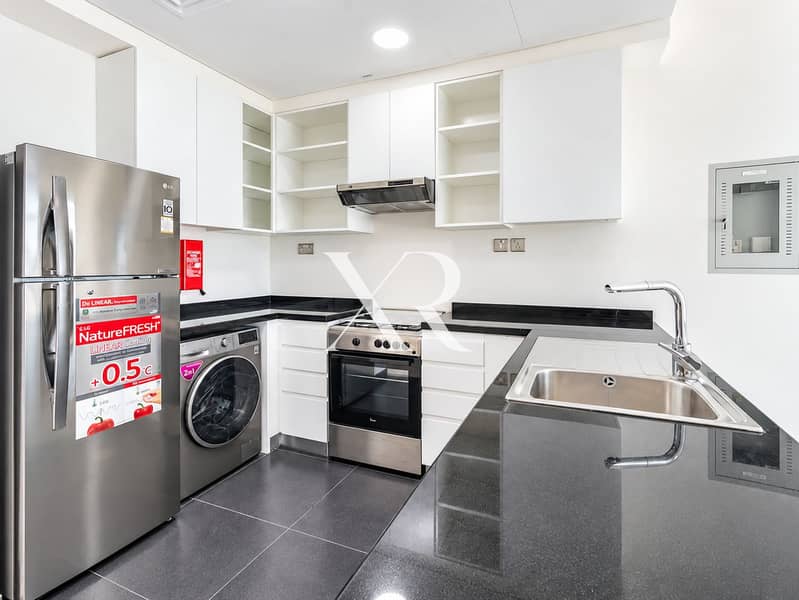 2 Modern Minimalist Kitchen with Stainless Appliances. png