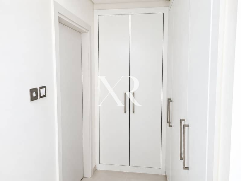 5 Minimalist White Hallway with Built-In Wardrobes. png
